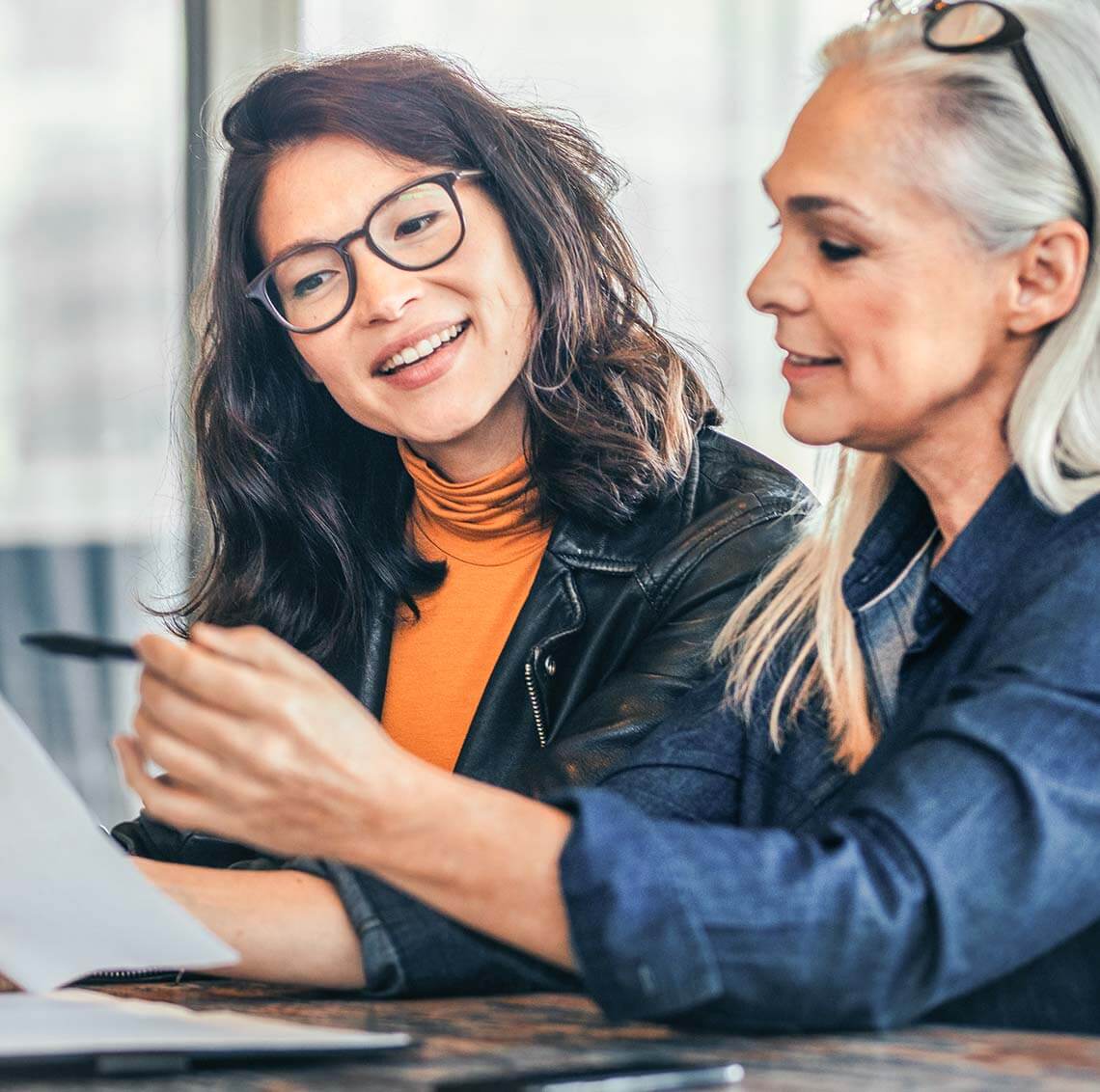 People looking at marketing materials